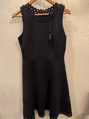 NWT black white House Black Market Black Sleeveless cocktail dress. Size 4